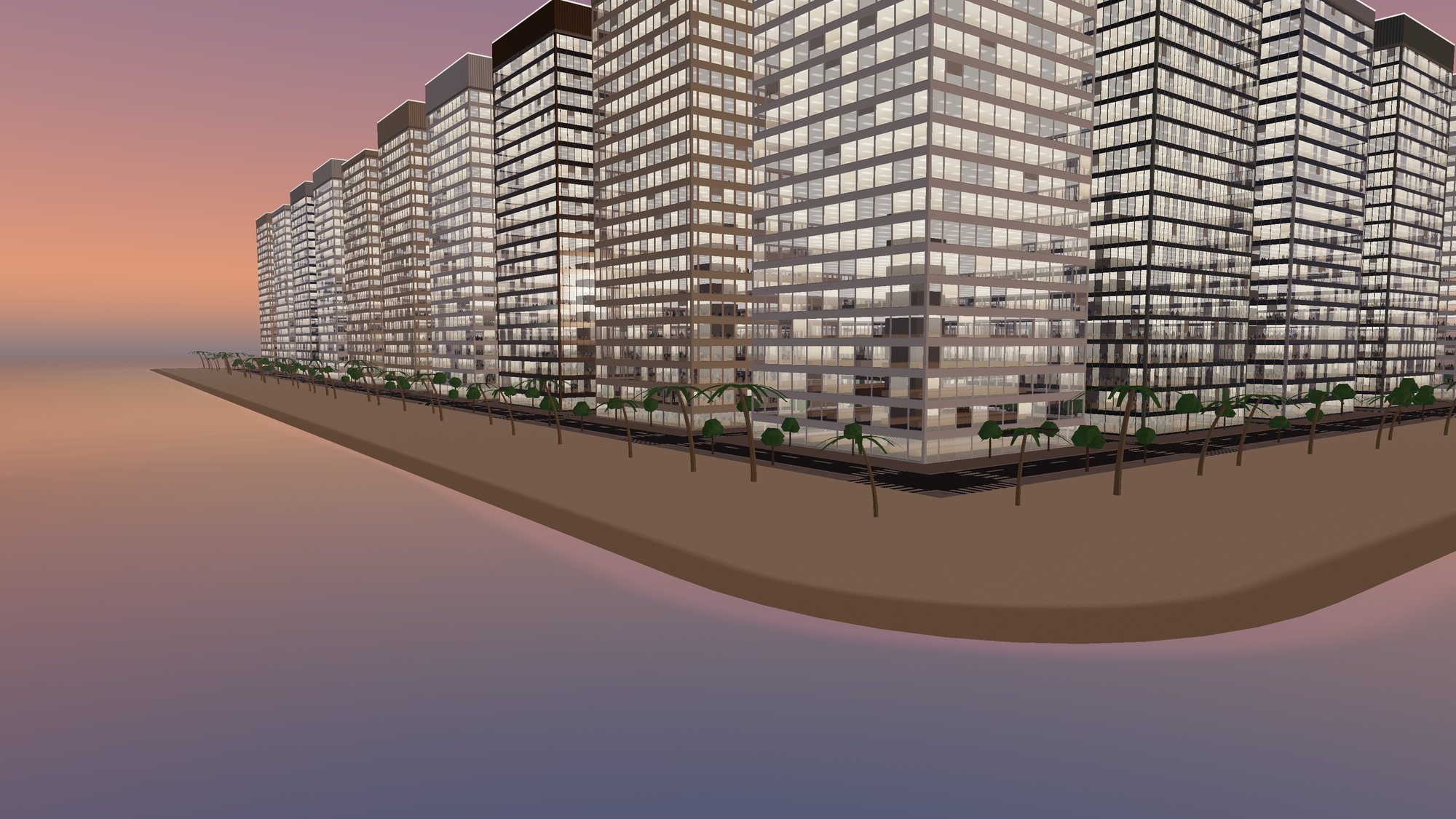 The district skyline across the water at sunset